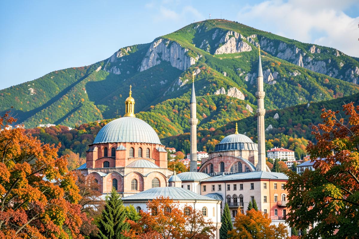 Historic mosque in Bursa with the green slopes of Uludağ behind